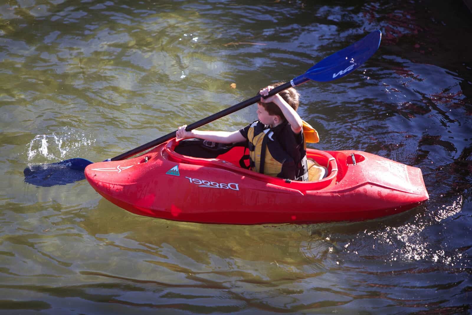 A child in a kayak.