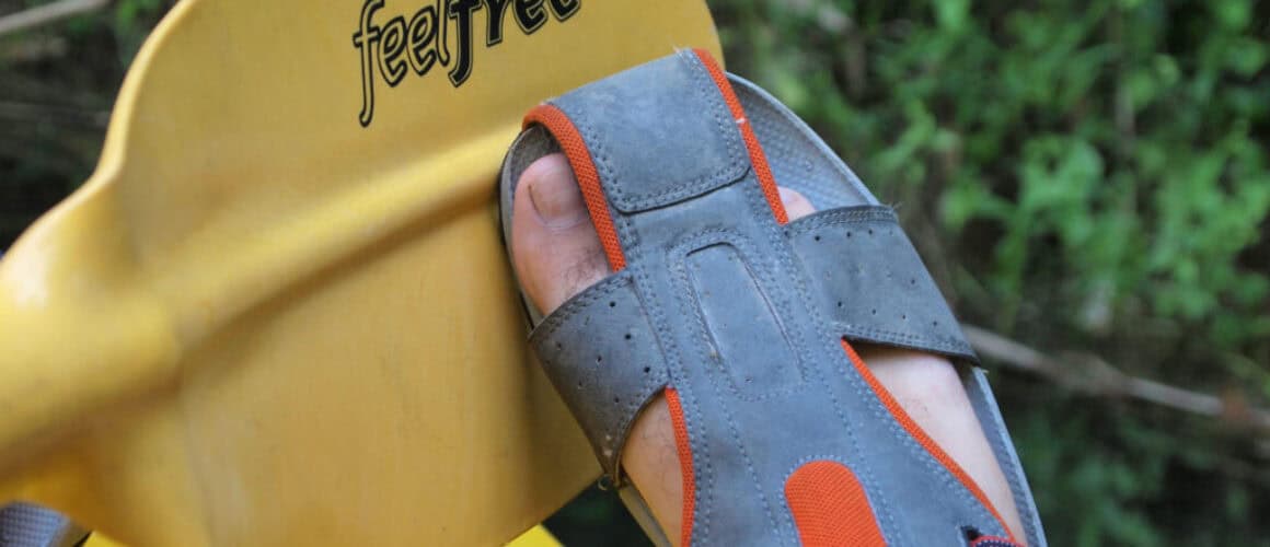 Kayak paddles on lake in Surat Thani, Thailand